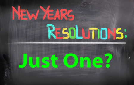 Multi-colored words on chalkboard: New Years Resolutions: Just One?